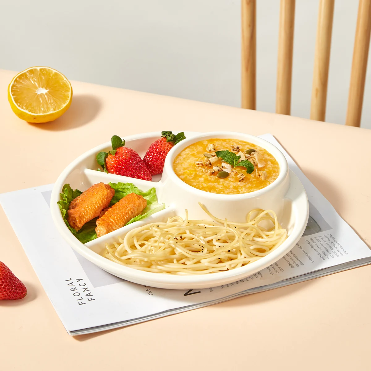 Durable plastic divided plate available in pink, white, and green.