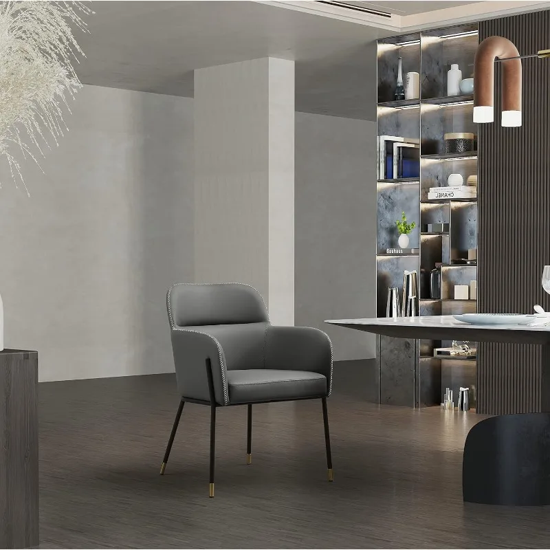 

Темно-серая искусственная кожа, черные, матовые ножки в латунном обеденном кресле