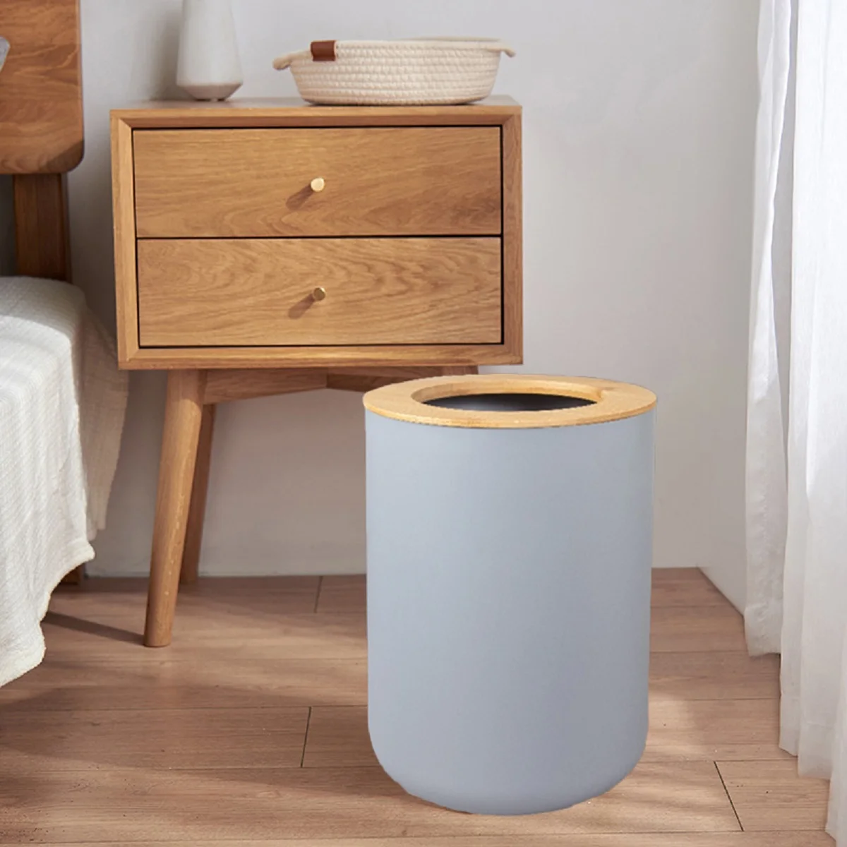 Sleek Black Plastic Waste Bin for Modern Kitchens and Bathrooms