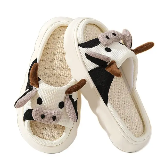 Zapatillas de lino de vaca y leche para hombre y mujer, sandalias de Interior para las cuatro estaciones, toboganes de dibujos animados para adultos, zapatos transpirables para el hogar para parejas, gran oferta