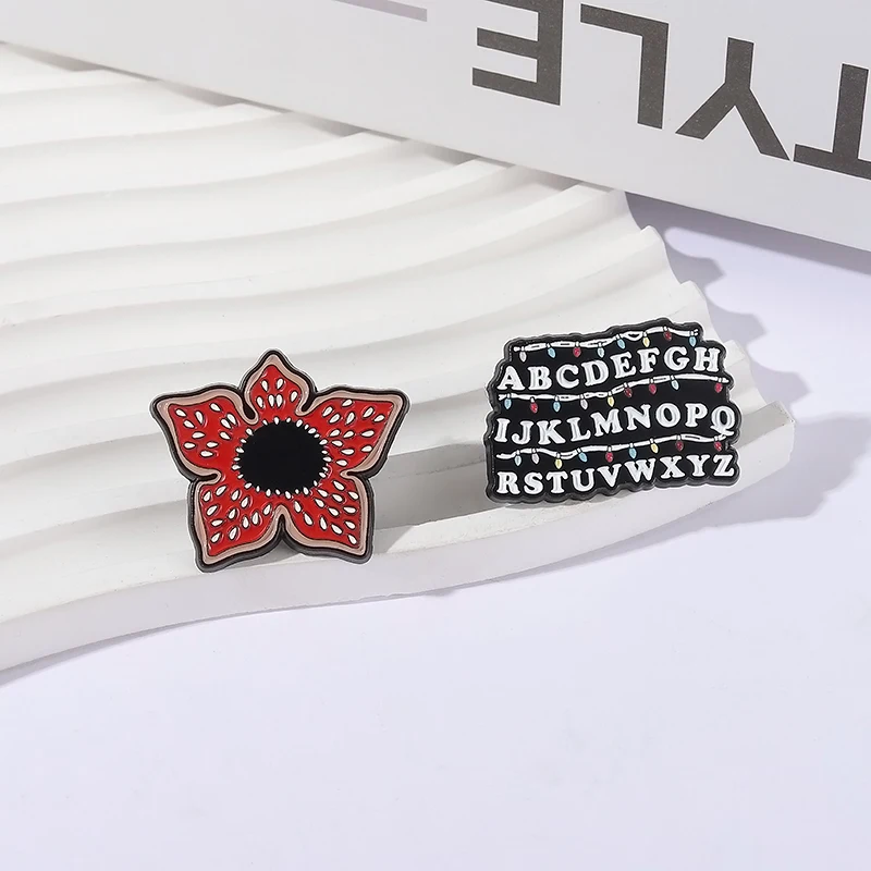 Sci-fi Horror Movies Brooch Enamel Pins Red Cannibal Flowers And 26 English Letter Brooches Backpack Lapel Badge Jewelry Gifts Image 7