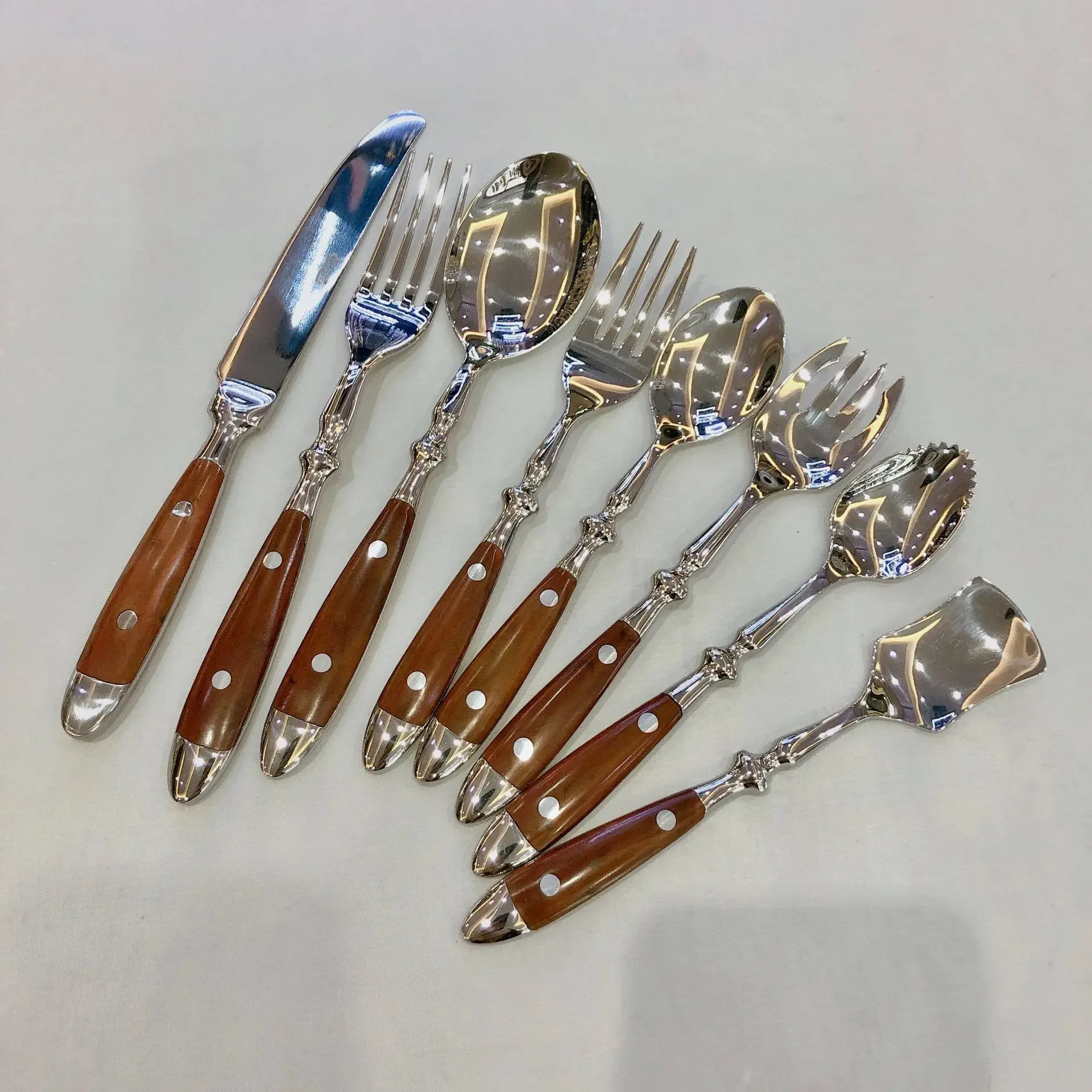 

Western style wooden handle stainless steel knife, fork, spoon, three piece set for household steak knives and forks