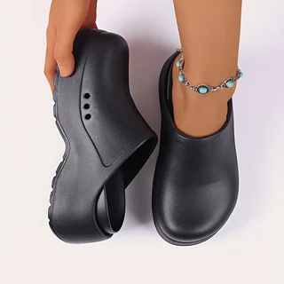 قباقيب البغال النسائية ذات اللون الصلب المغلقة عند أصابع القدم، فتحات جانبية قابلة للتنفس، نعل سميك من مادة EVA