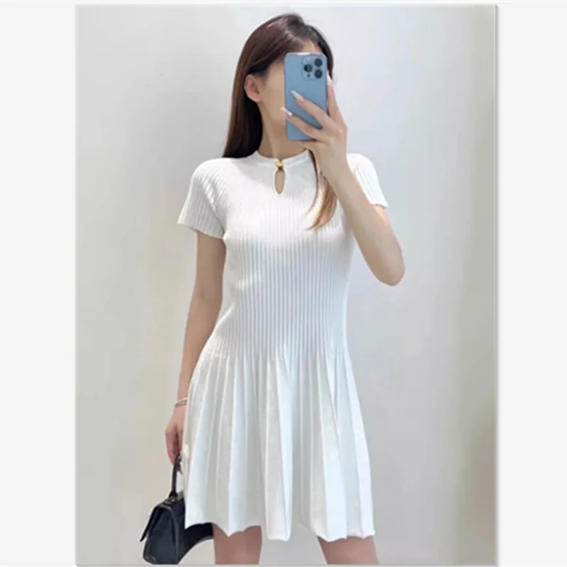 صيف جديد الفرنسية أنيقة الجوف خارج فستان محبوك أزرار الموضة المرأة بلون قصيرة الأكمام سليم ألف خط فستان الحفلات 378P