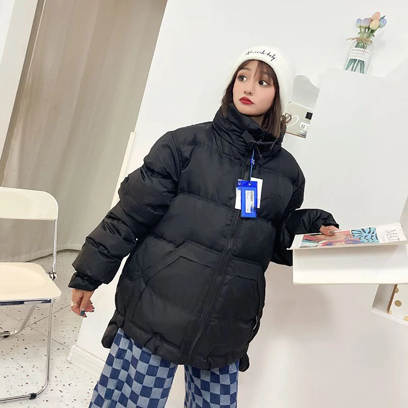 Рисунок 2 - Пуховик женский средней длины на