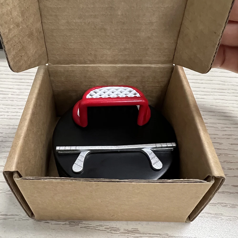 PUCKUPS - Indestructible Hockey Puck Cell Phone Stand - The-259121