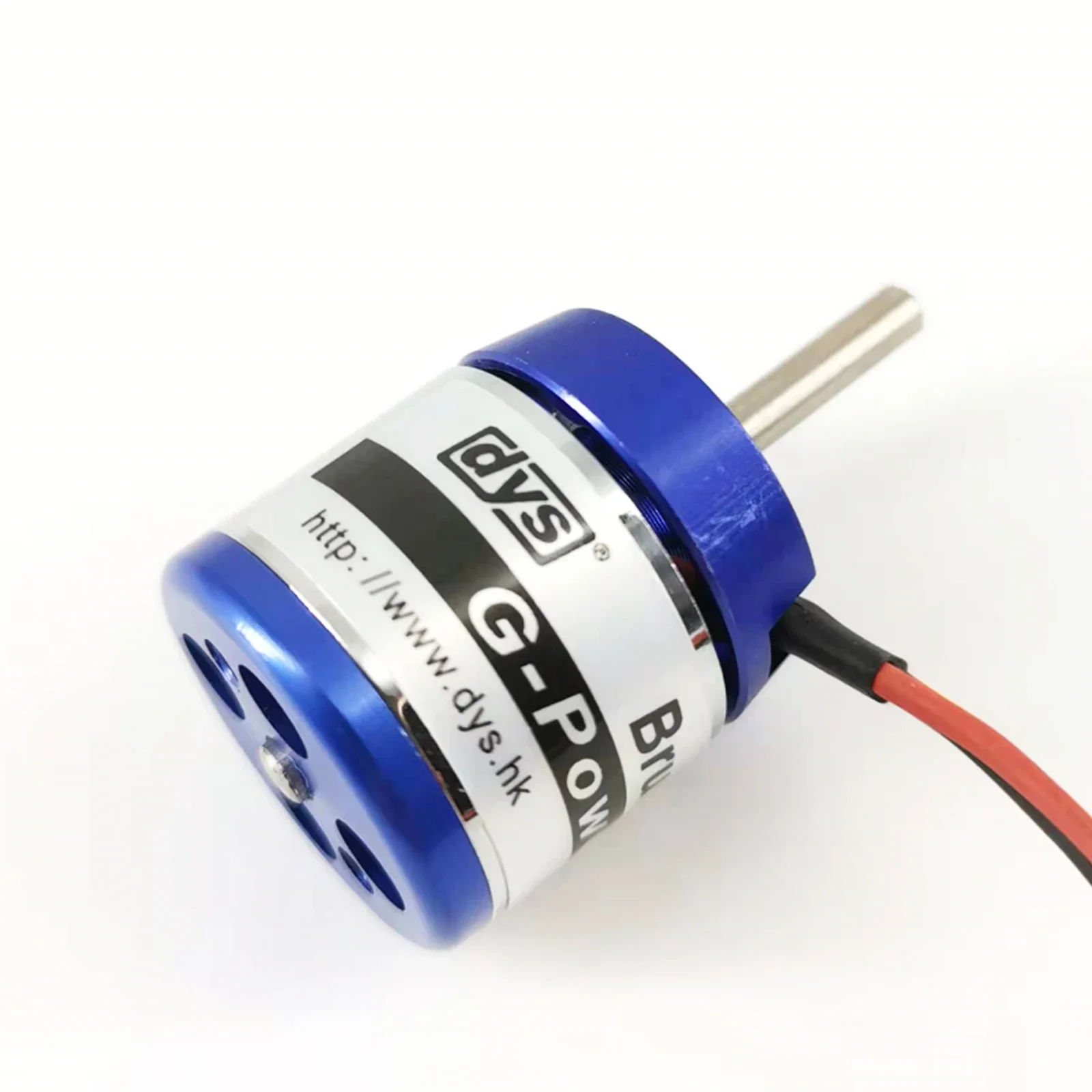 Moteur brushless D2225 1350KV posé sur une surface blanche, câbles de sortie visibles.