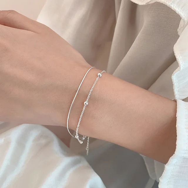 Silver lucky bracelets with a round ball shape