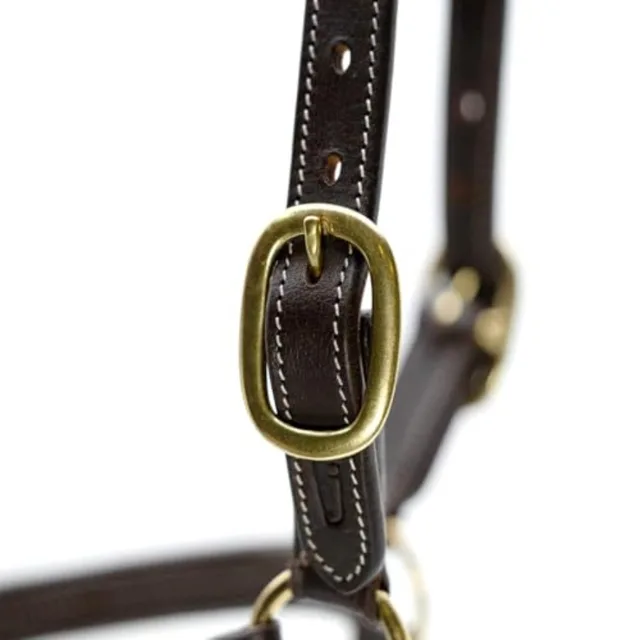 Horse turnout halter for outdoor use soft leather material black color triple-stitched durability and throat snap with adjustab