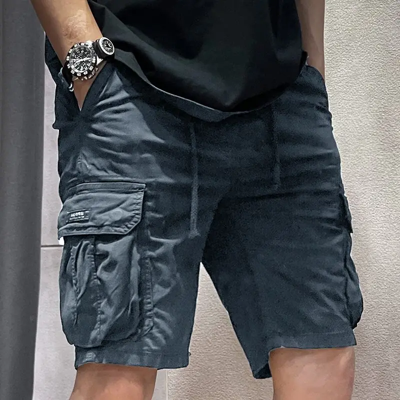 thumbnail image 1 of Pantalones cortos cargo para hombre con cordón ajustable, color caqui liso, elásticos, con bolsillo frontal, bermudas anchas de nailon de lujo para hombres grandes y altos, 1 of 5
