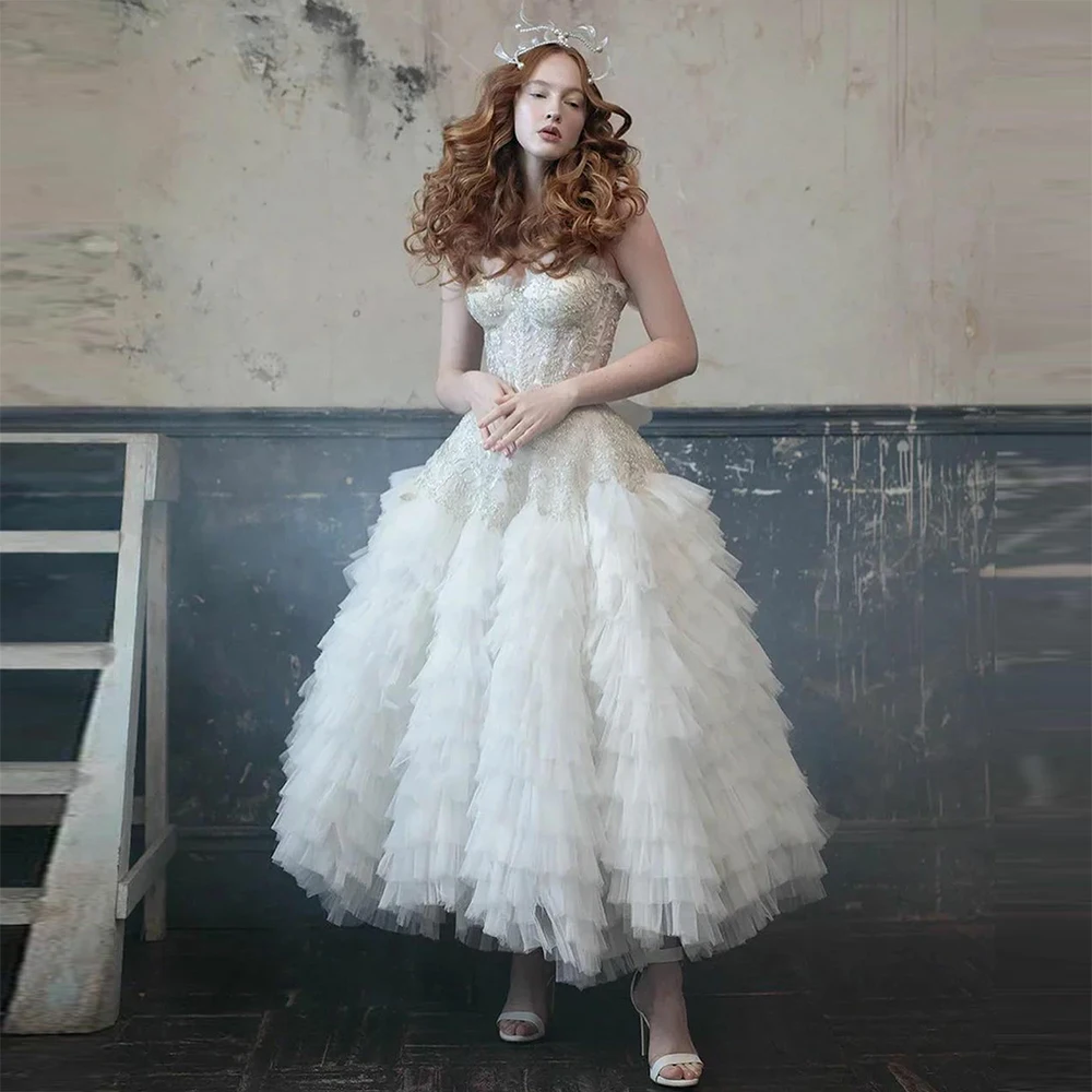 

2023 New Gorgeous Lace Appliques Ruffled Tulle Evening Dresses Ball Gown Beading Prom Gowns Crystal Sleeveless Tiered Party