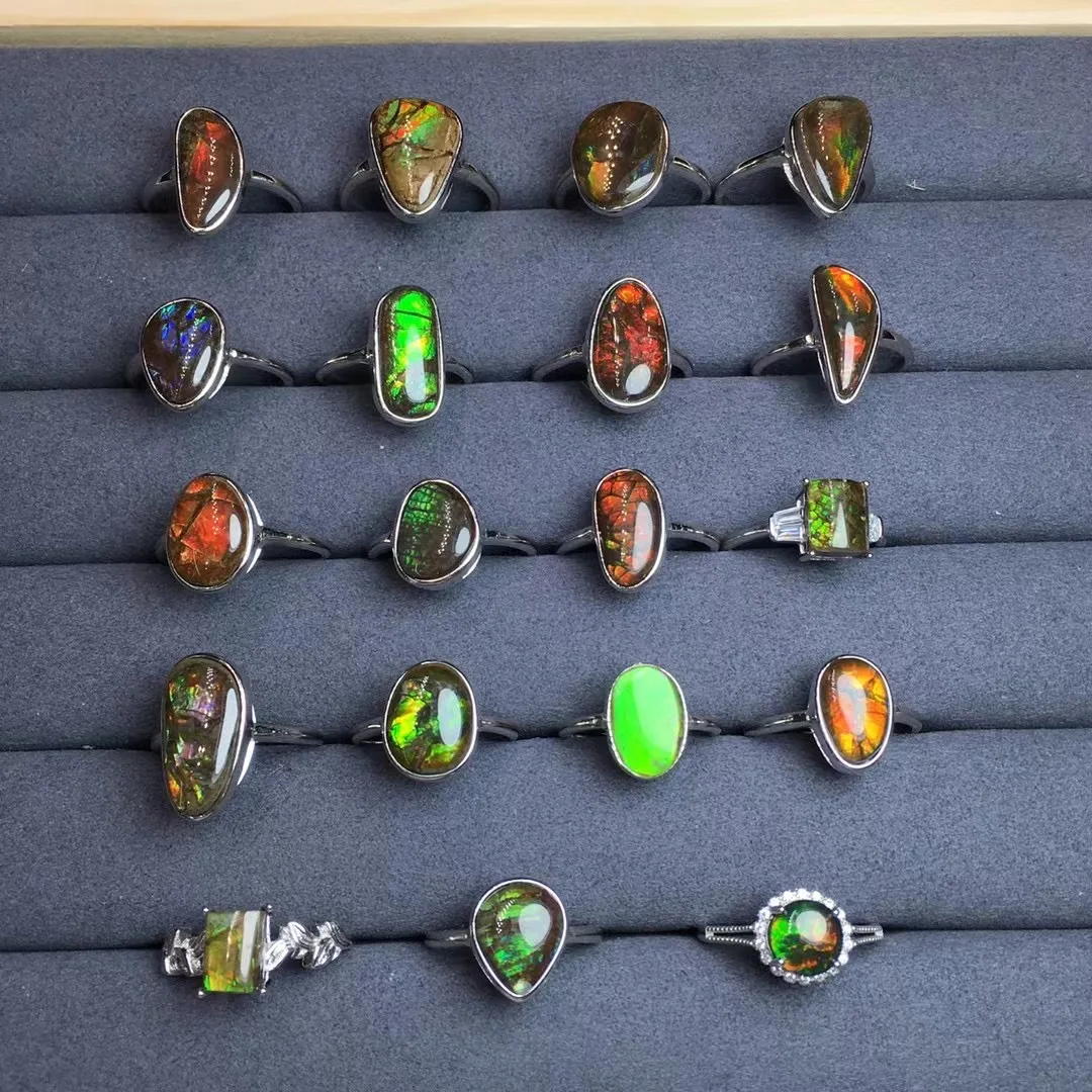 

Женское и мужское кольцо из серебра 925 пробы с амоллитом