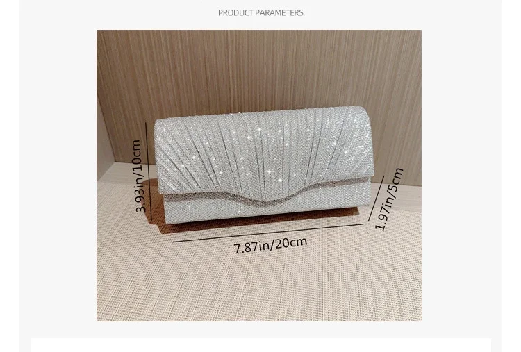Luxury silver glitter evening clutch bag with shimmering finish.