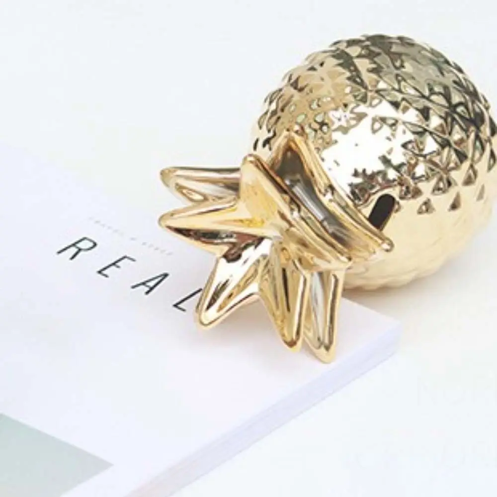 Tirelire ananas en céramique dorée objet décoratif et épargne_voghion.com