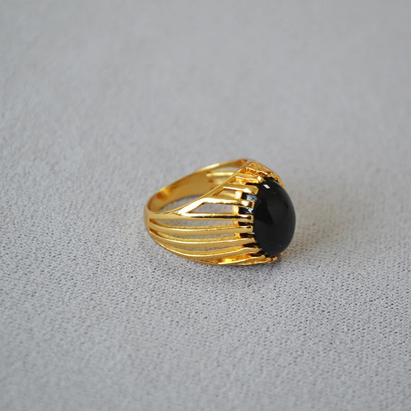 

Small crowd design, hollowed out palace style brass plated gold inlaid black agate personalized ring, female index finger ring