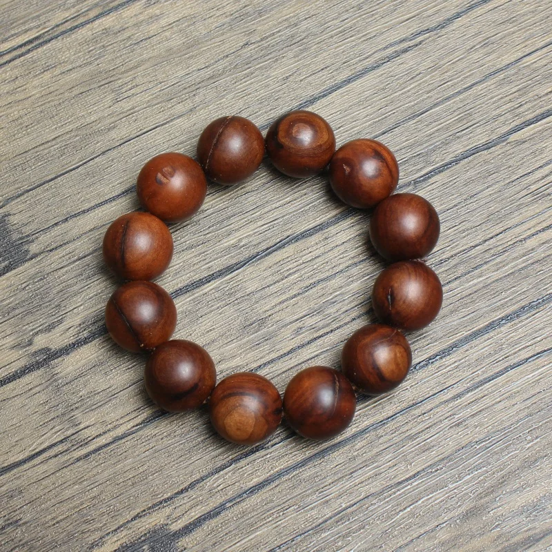 

Браслет из бусин и деревянных поделок с молнией Strike Jujube 2,0