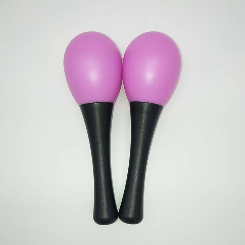 Plastic maracas Orff instrument players hold plastic maracas Toddlers Early education Children grasp egg