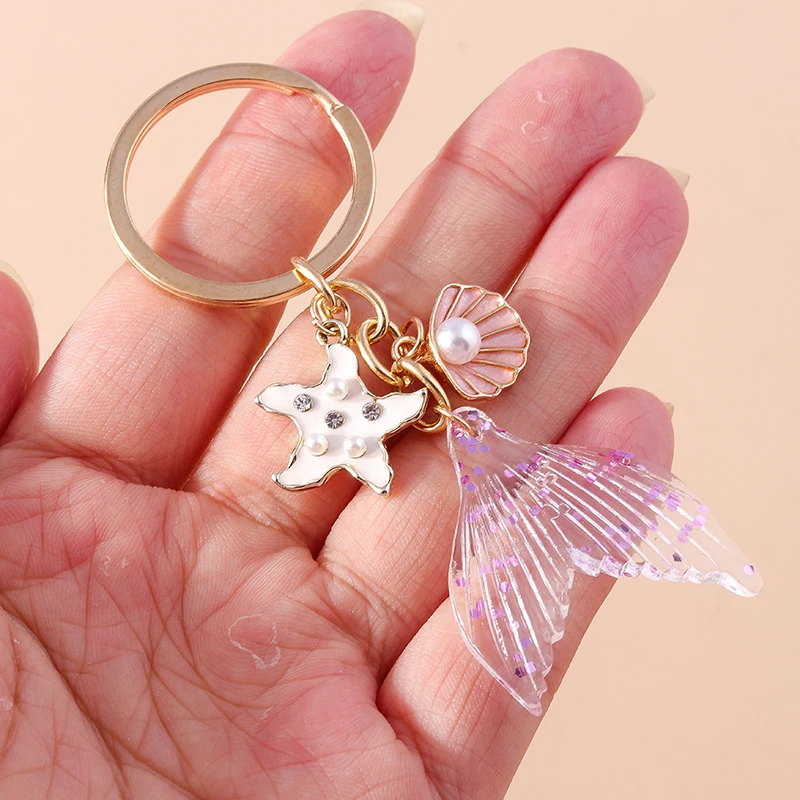 SORGERLY Beach Starfish Bag Charm Keychain - Cute Coastal Seashell Conch Pearl Summer Gifts - Gold Key Chain Purse Handbag Accessories For Women At Women's Clothing Store