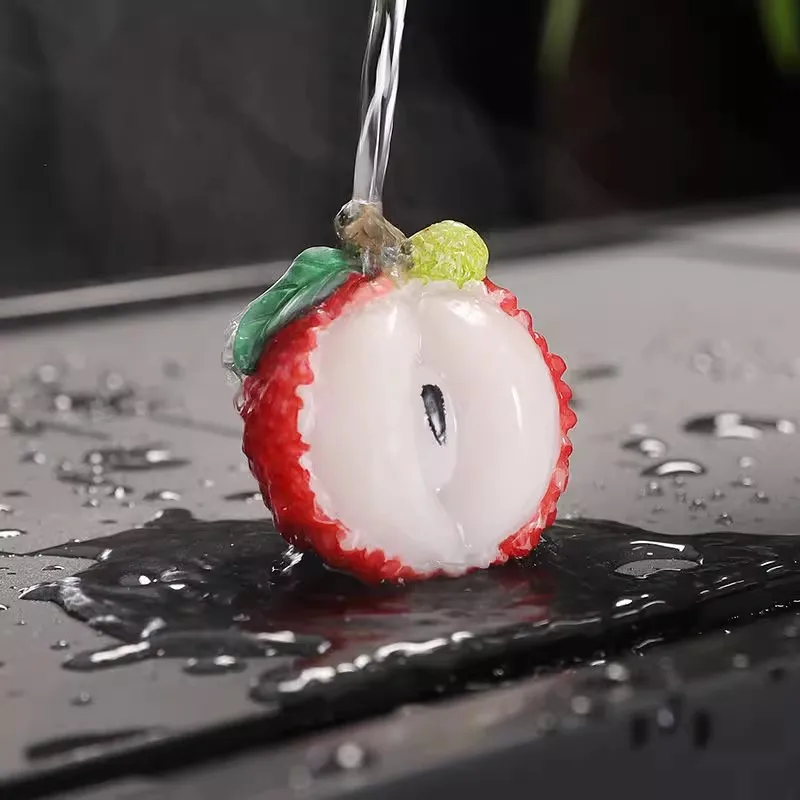 Color changing fruits, tea pets, peaches, strawberries, lychees, ornaments that can be used to cultivate tea sets, handmade