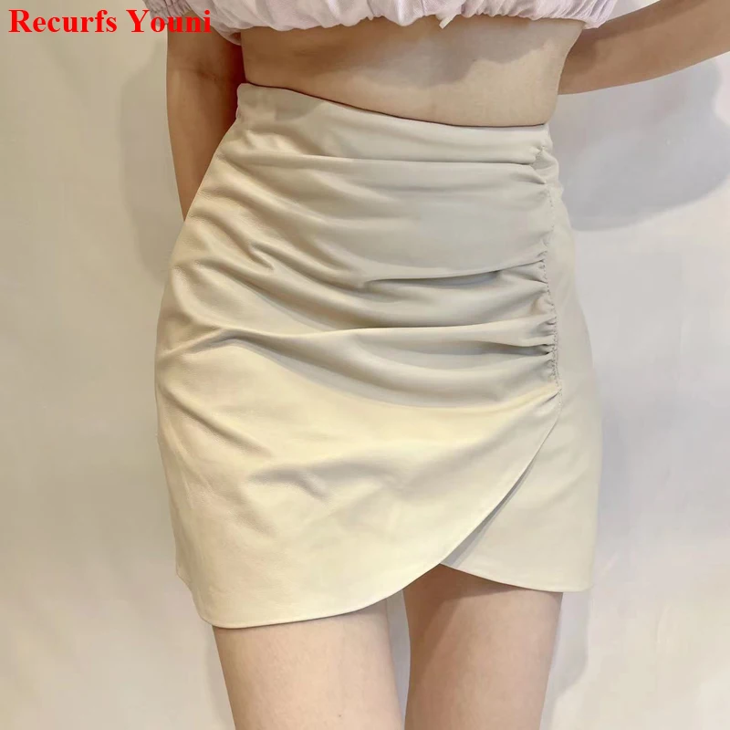 

Leather Mini Skirt For Women 2023 Oozing Style Asymmetric Cross Hem Wrinkled Short Jupe Mujer Sexy Slim Show Long Leg Saias Moda