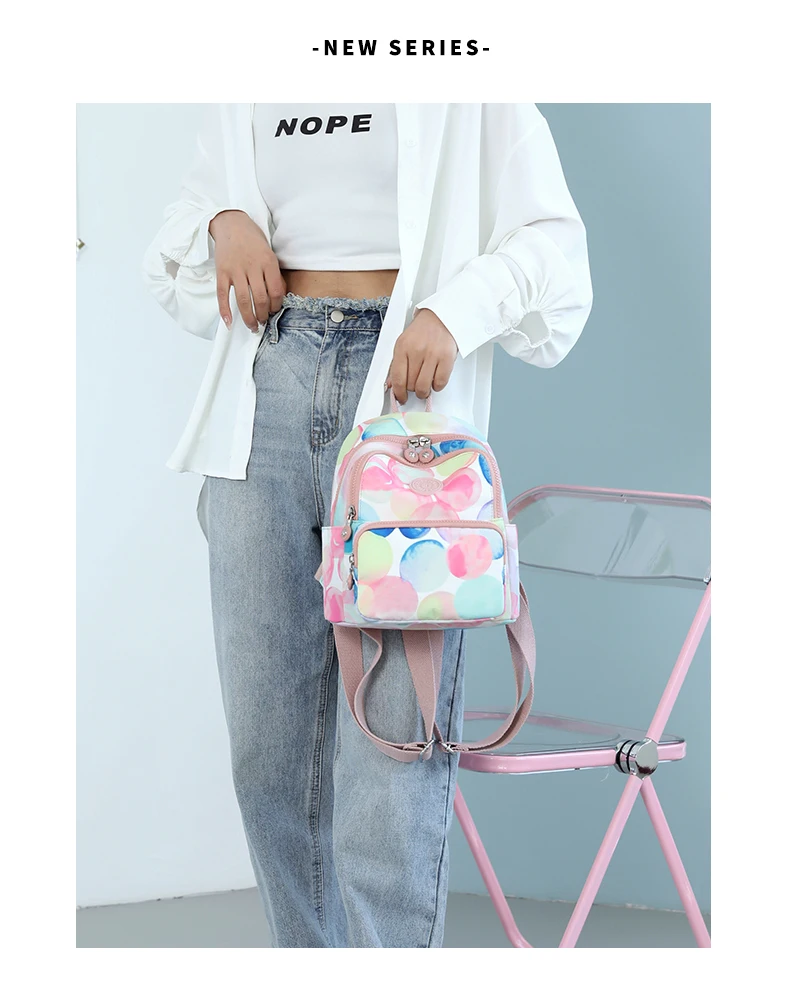 2022 Spring New Candy Color Ladies Backpack Waterproof Nylon Travel Backpack Young Girl School Bag Mobile Phones Bag Mochilas