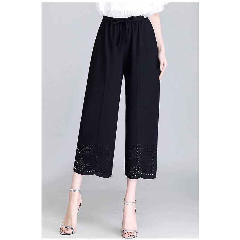 

2023 Fashionable Loose Fitting Casual High Waisted Lace Up Hollowed Out Jacquard Temperament Versatile Nine Point Wide Leg Pants