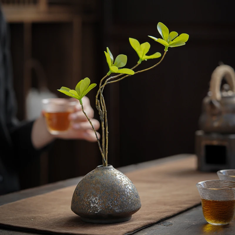 

small vase with simple dry flower insertion, artificial flower tea table decoration, coarse ceramic retro flower vase
