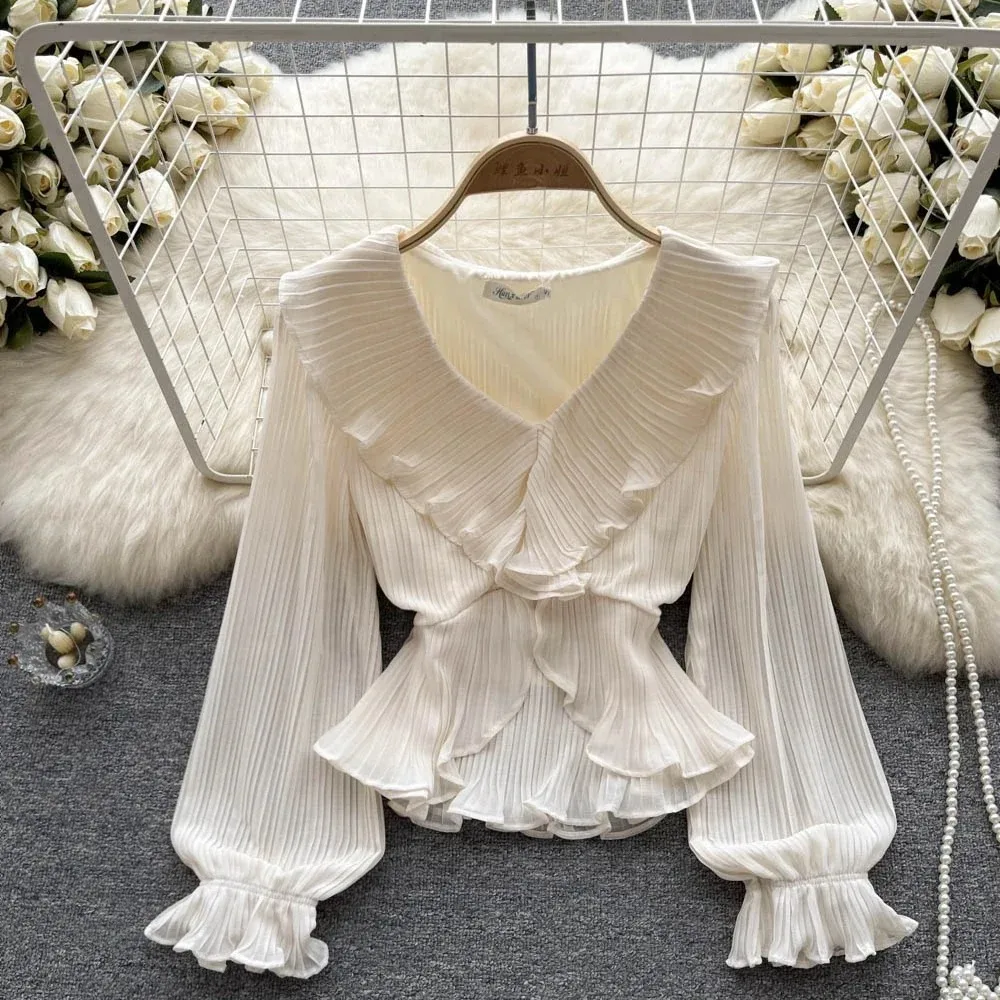 white ruffle v neck blouse