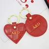 Wholesale free custom initial keychain metal ring embossed croco pattern genuine leather heart car leather keychains 2