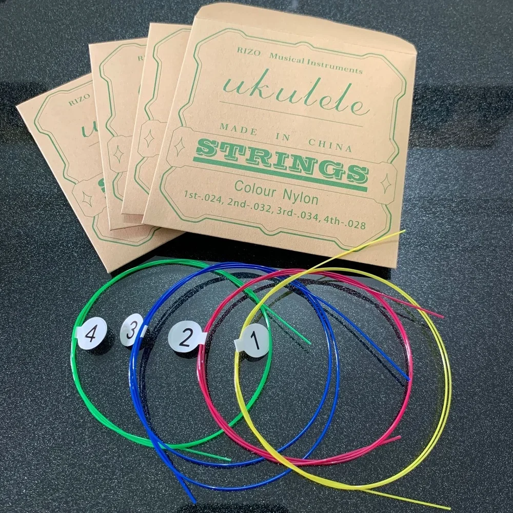

4PCS Ukulele Guitar Strings Set Colorful Nylon Strings for 21/23/26 Inch Ukulele Universal