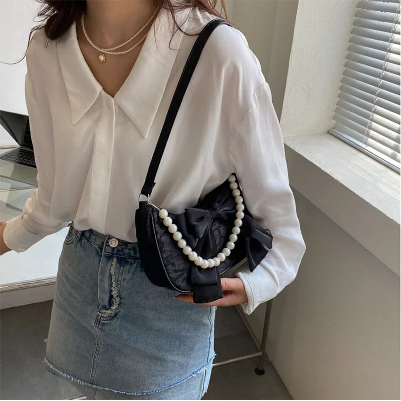 Fashion bow handheld pearl bag trend new crossbody small bag ladies shoulder