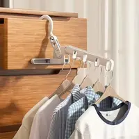 Folding Hanger Rack Heavy Duty Clothes Hanger Clothes Storage Organizer Hotel Room Camping Laundry Solution  Clothes Organizer 1