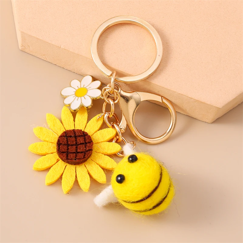 Modischer handgefertigter gestrickter Sonnenblumen-Schlüsselanhänger für Damen und Herren, Autoschlüsselhalter, Handtaschenanhänger, Schlüsselringe, Accessoires, DIY-Geschenke