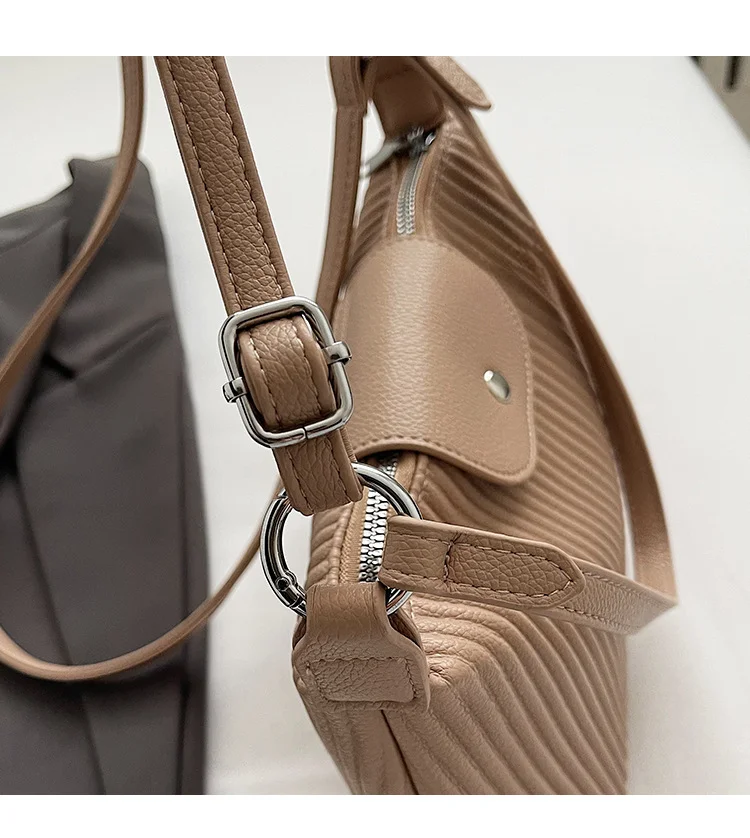 Niche design pleated striped 2024 new women's versatile and simple single shoulder pillow crossbody armpit bag_voghion.com