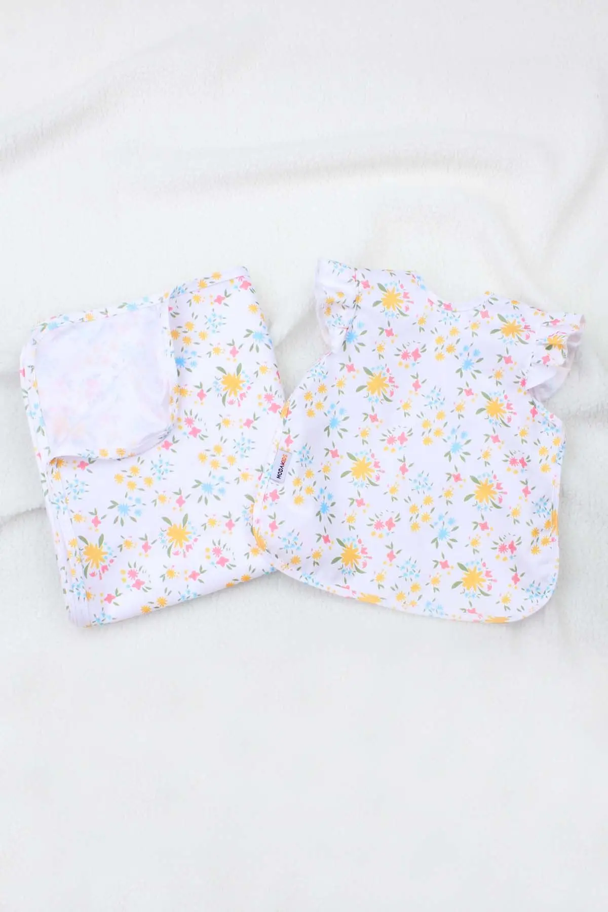 

Modakids Spring Flower Fluid Bib and High Chair Cover