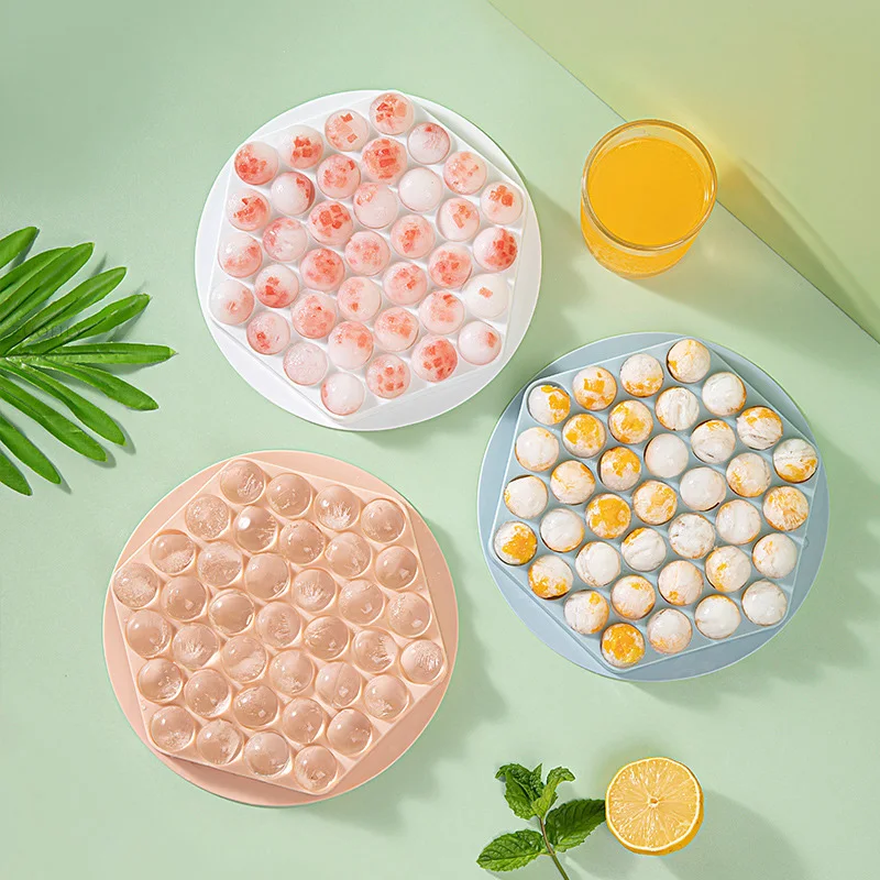 https://ae01.alicdn.com/kf/Sfceacdfaf2404995a6b1ed2b0de5cea9C/Hexagonal-Ice-Cube-Tray-Mold-37-grid-with-Lid-Round-Ice-Ball-Maker-for-Ice-Cream.jpg