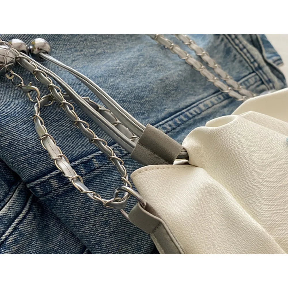 Drawstring bucket for women 2024 new Korean fashion shoulder bag, simple commuting contrasting color heart chain_voghion.com