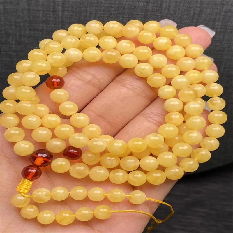 

Russian Natural Beeswax 108 Beads Yellow Chicken Grease Necklace Bracelet