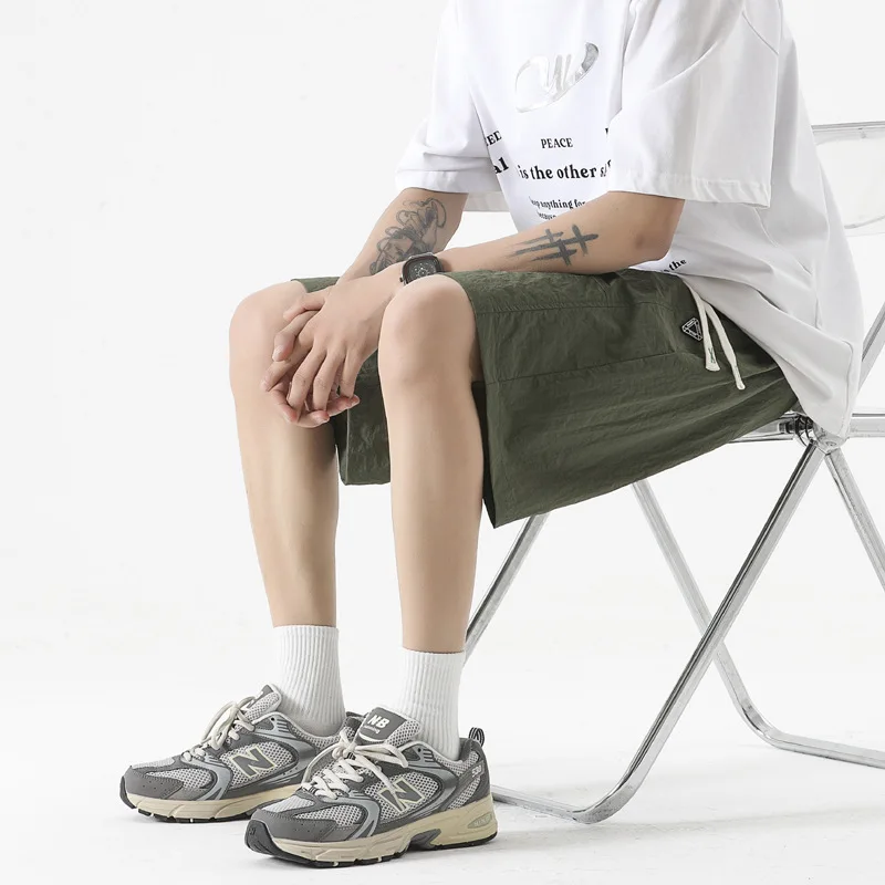 Large size casual shorts, quick drying and breathable capris, men's large size loose trendy casual sports ice silk pants