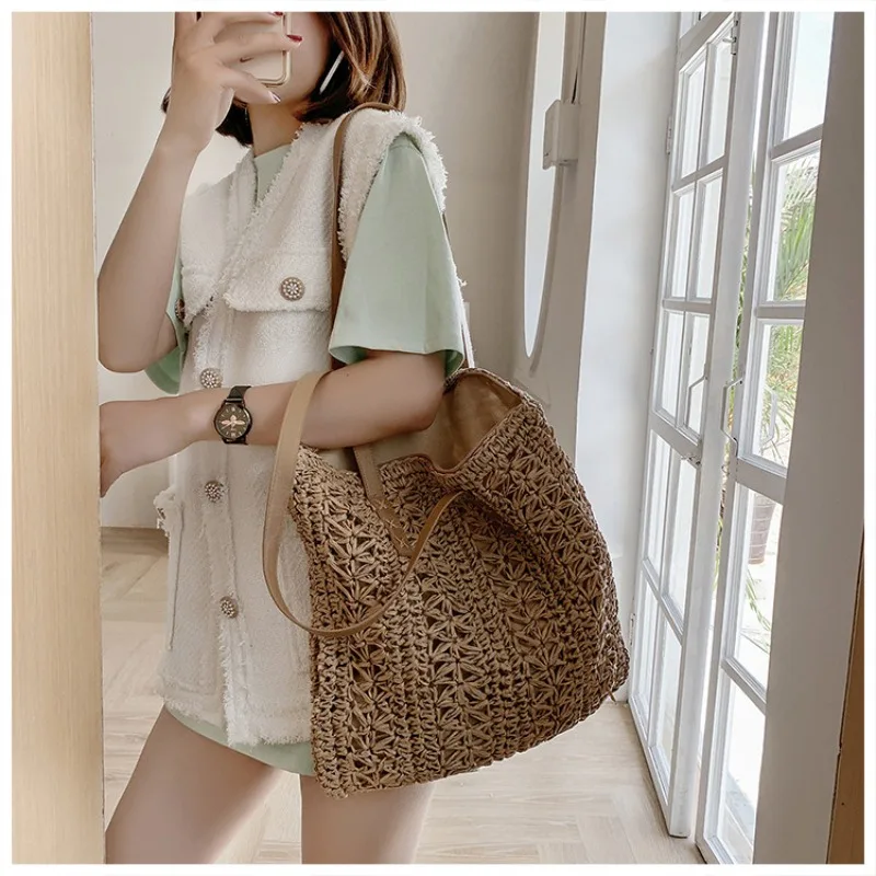 

Popular 2023 New Hollow Out Single Silk Woven Bag Fashion Shoulder Grass Woven Bag Leisure Women's Beach Bag