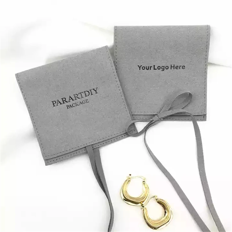 sheepsew-customize-logo-gray-deboss-print-elegant-design-ribbon-flap-suede-microfiber-packaging-bag-jewelry-pouches