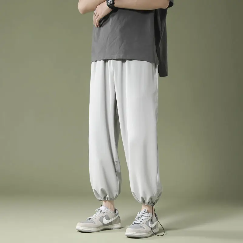 2023 New Summer Slim Fashion Cool Ice Silk Loose Trend Sports Casual Quick Drying Versatile Leggings Men's Solid Color Pants