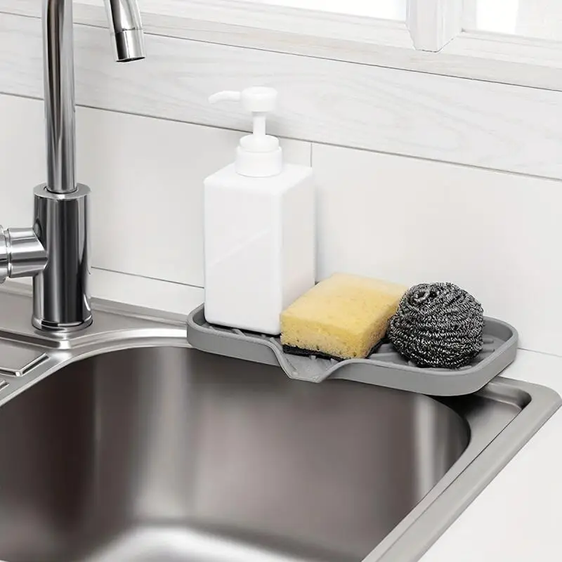 https://ae01.alicdn.com/kf/Sfd0e419b99b8492caf0e7d707d5618b0X/Silicone-Faucet-Mat-Kitchen-Sink-Tray-Soap-Dispenser-Sponge-Drain-Pad-Sink-Splash-Drying-Mat-Countertop.jpeg