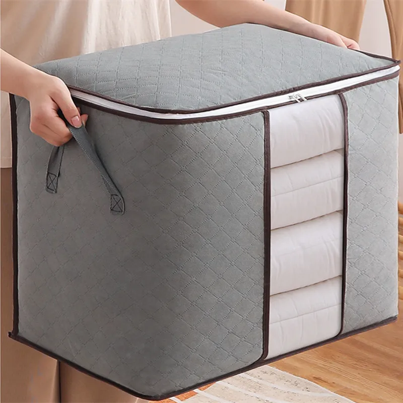 https://ae01.alicdn.com/kf/Sfd0f0292c14b47cdb7c434b6ac7999a4f/Home-Clothes-Quilt-Folding-Storage-Bag-High-Capacity-Organizer-Boxes-Closet-Dustproof-Blanket-Closet-Under-Bed.jpg