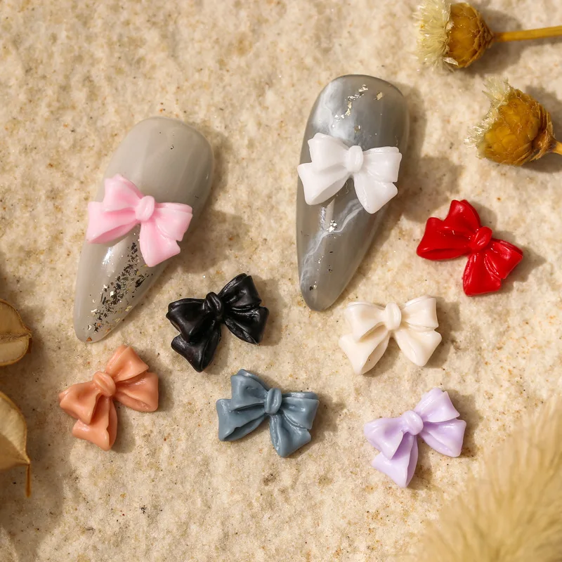 50pcsConventionalgrindingbowknotnailartacttastedtrumpetjoker