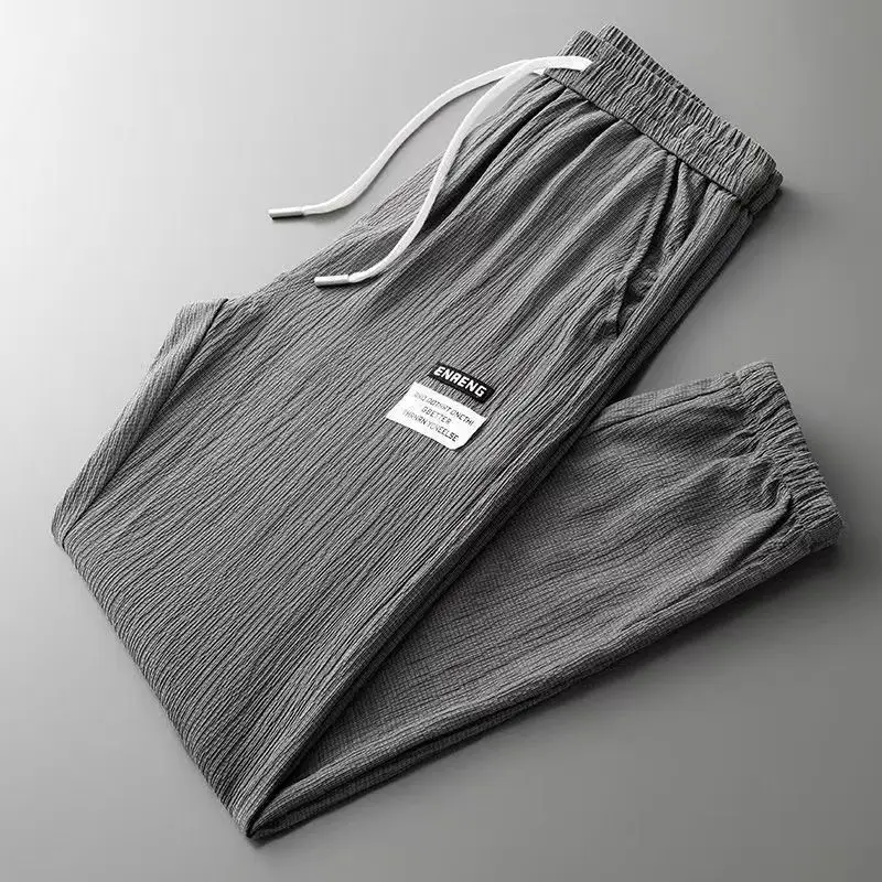 thumbnail image 1 of Pantalones de seda fina de verano para hombre, pantalones casuales para hombre, adolescentes, de secado rápido, deportivos, sueltos, de talla grande, pantalones de protección a la moda, 12 piezas, 1 of 5