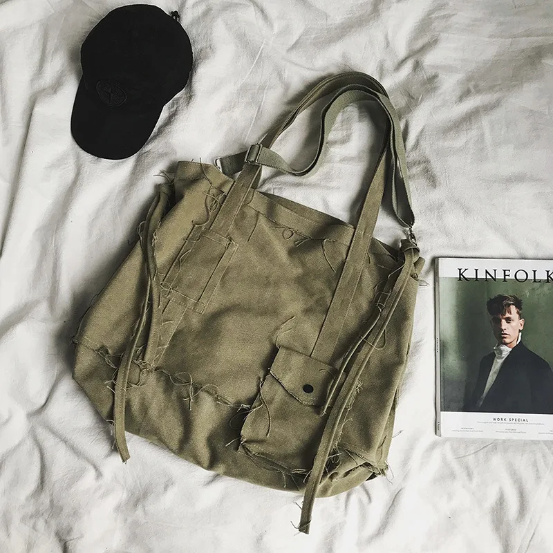 KK  2024 New Burted Hole Hip Hop Crossbody Irregular Canvas Bag for Men and Women, Large Capacity