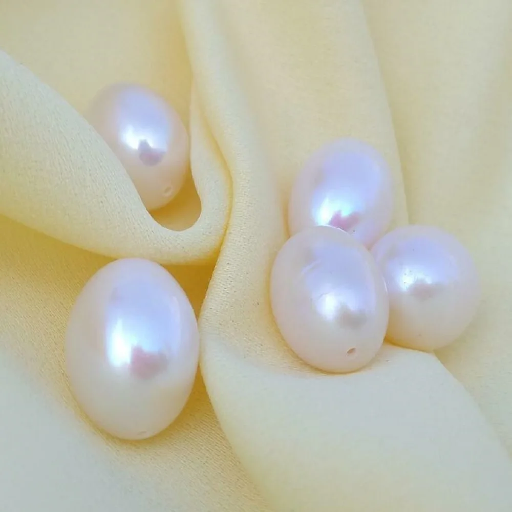 

A charming 5-piece set of white AAAA South Sea bulk pearls fully drilled