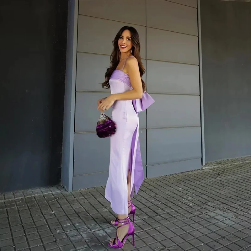 

Женское платье-комбинация с большим бантом на спине