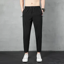 Spring and Autumn Men's Elastic Belt High Waist Solid Color Drawstring Panel Contrast Pocket Harun Nine Point Trousers Pants